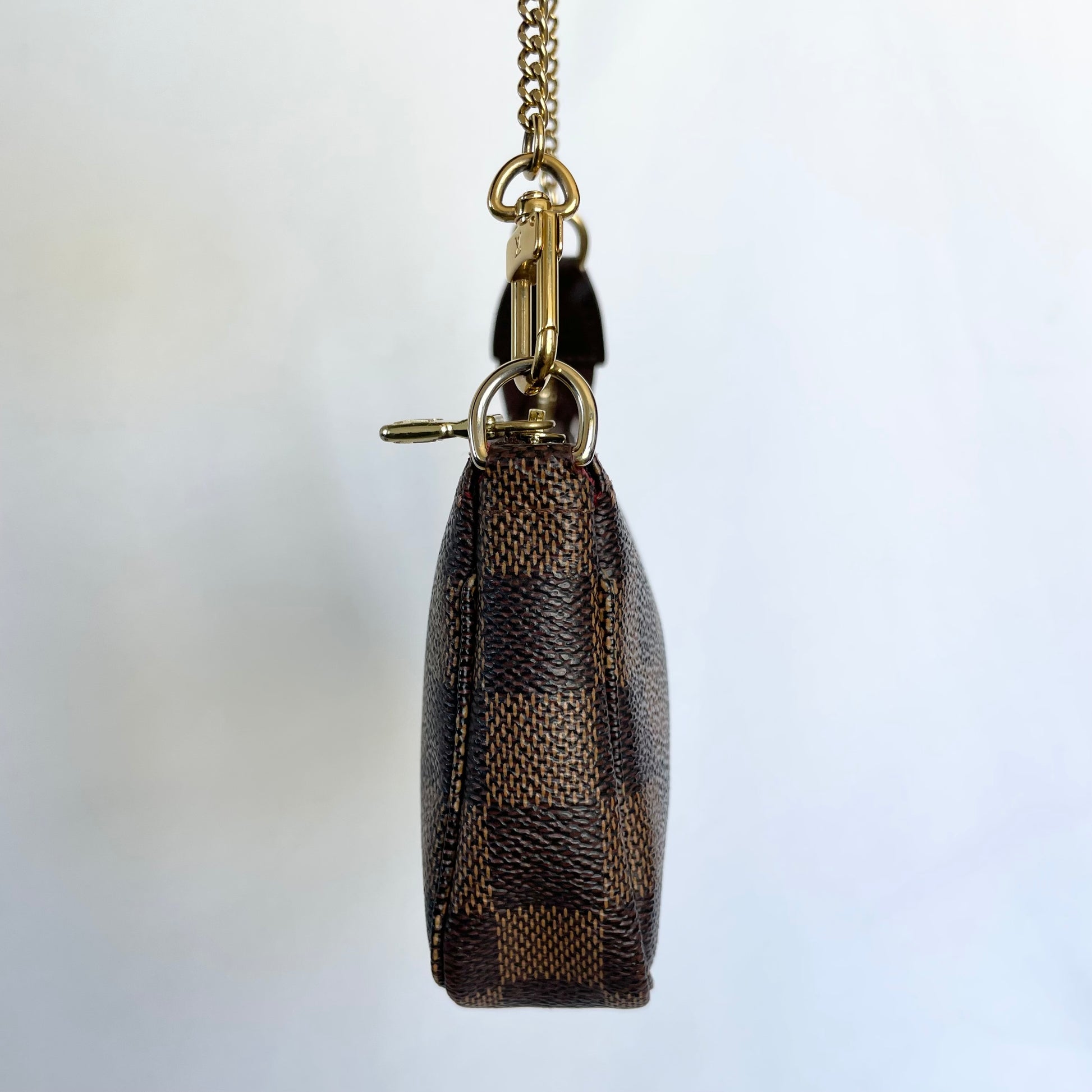 Authentic Louis Vuitton Mini Pochette Accessoires Damier Ebene