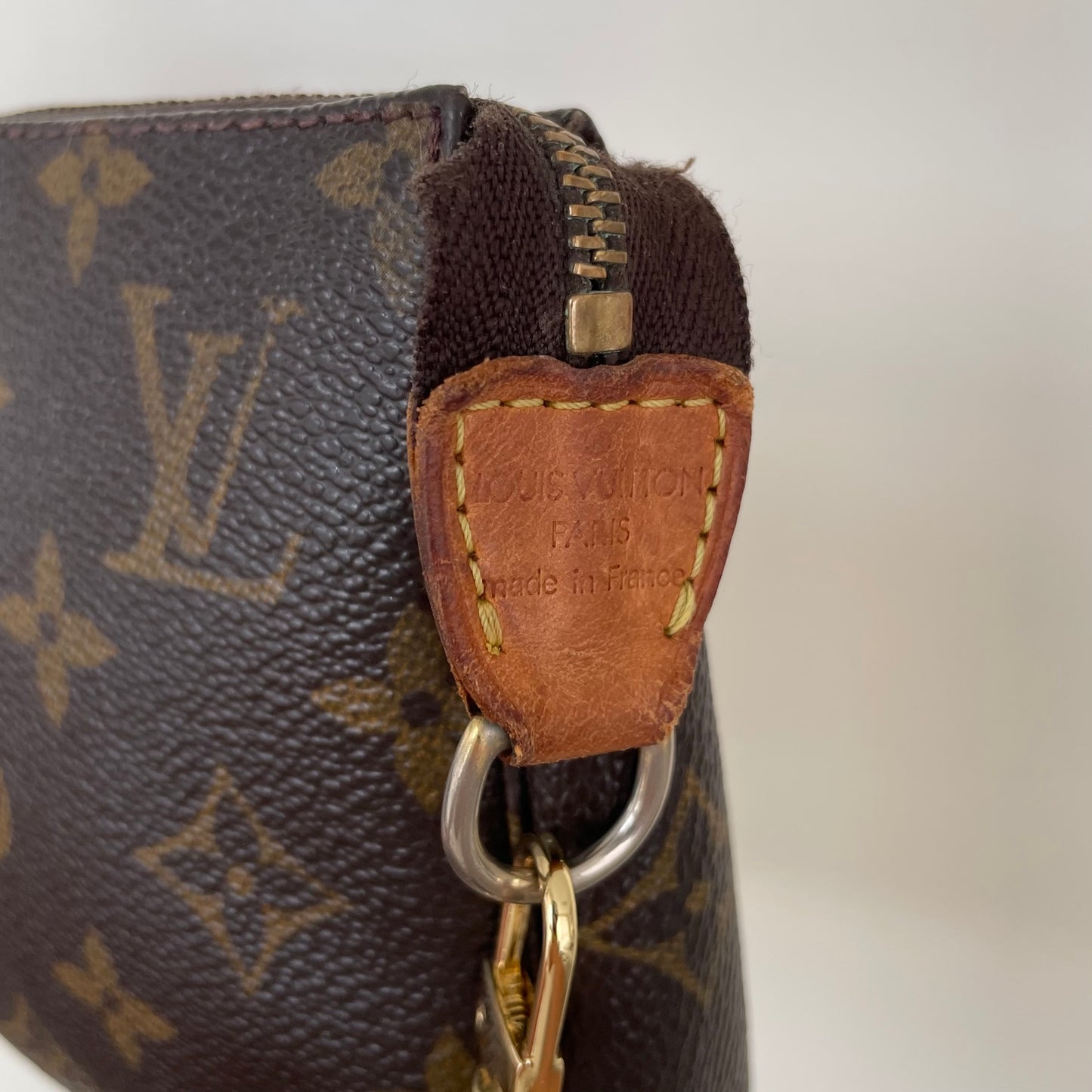 LOUIS VUITTON Monogram Pochette AR1928 with gold chain strap – LuxuryPromise