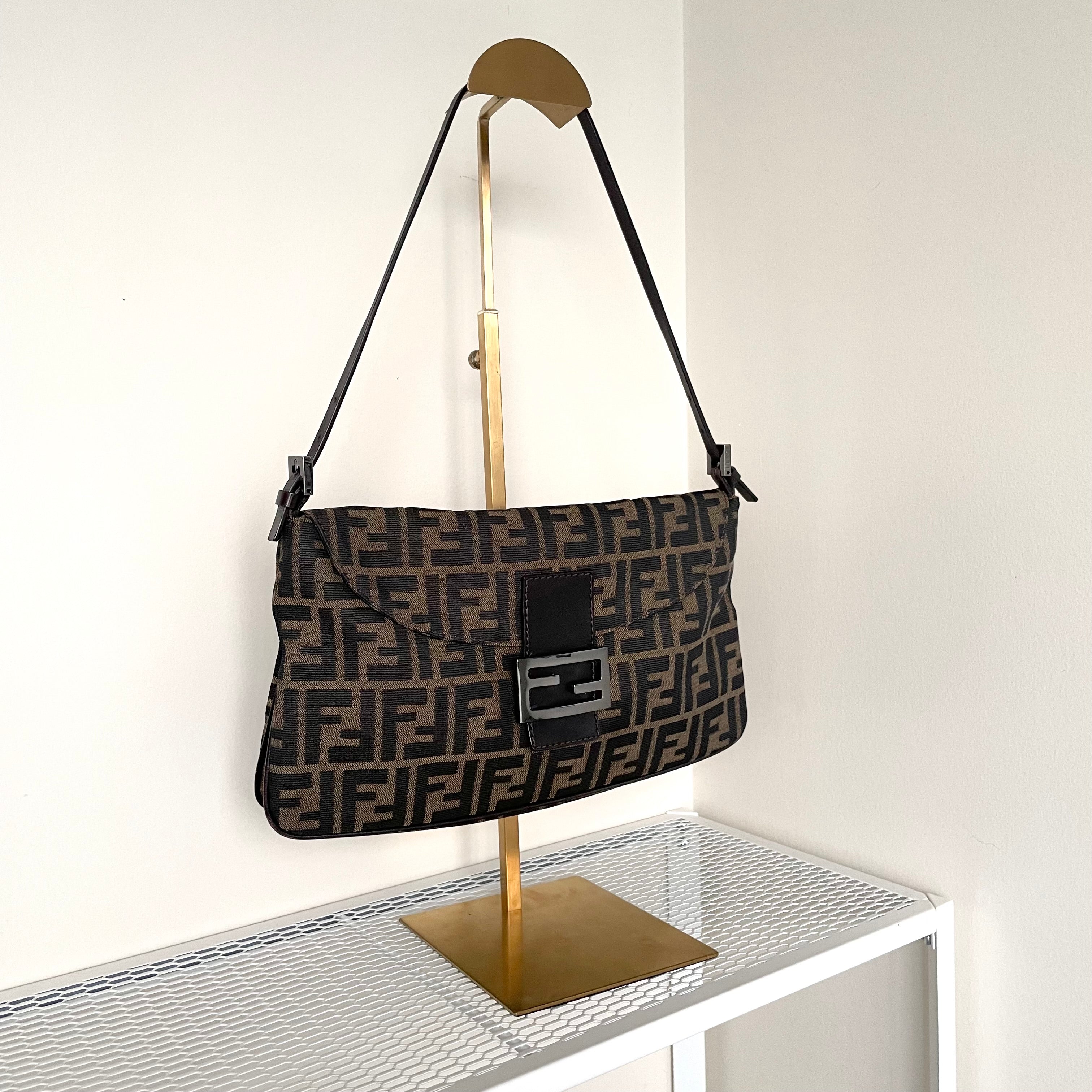 Black Chain Pouch mini leather clutch bag | Victoria Beckham | MATCHES UK